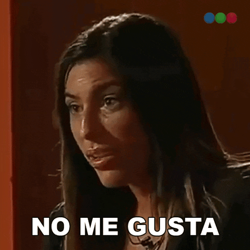 a woman says " no me gusta " in a dark room