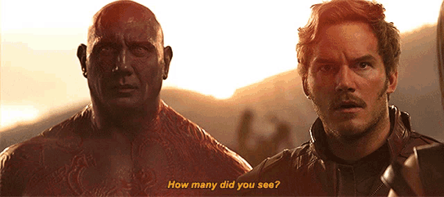 two men standing next to each other with the words " how many did you see " in yellow letters