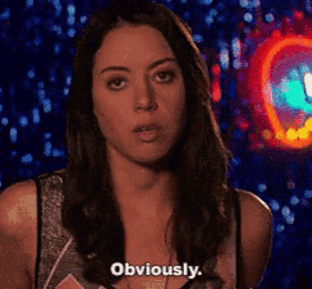 a woman says obviously in a dark room