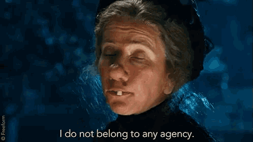 an older woman is talking to someone and says `` i do not belong to any agency '' .