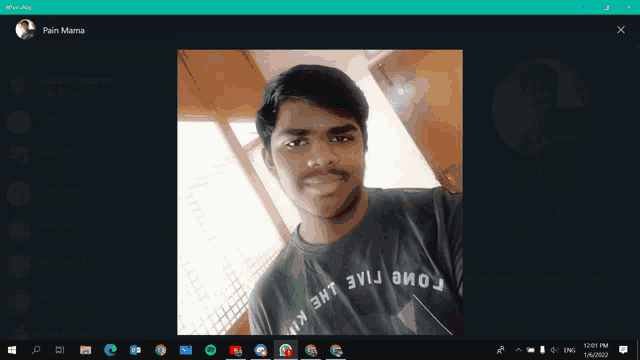 a computer screen shows a picture of a man with pain mama written on the top left