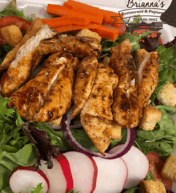 a chicken salad from brianna 's restaurant and pupusas
