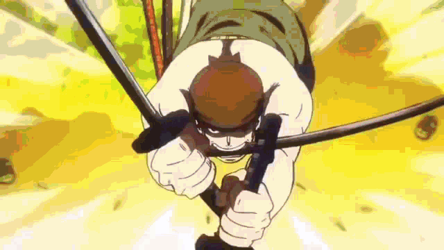 a close up of a person holding a sword in their mouth .