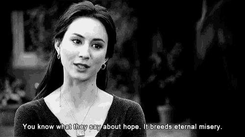 a black and white photo of a woman with a quote that says you know what they say about hope .