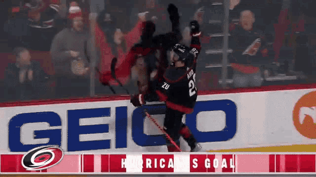 a hockey player with the number 22 on his jersey is falling