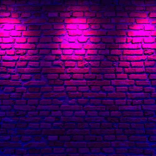 a neon sign on a brick wall says hoşgeldin