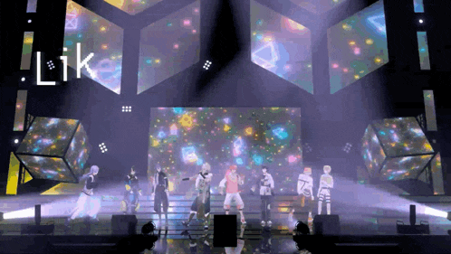 a group of people dancing on a stage with the word like on the screen
