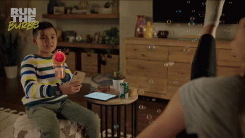 Playing With Bubbles Leo Pham GIF - Playing With Bubbles Leo Pham Run The Burbs S1e6 GIFs