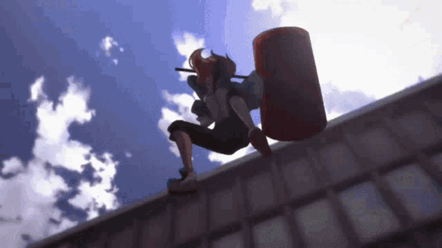 a person with a red barrel on their back is standing on the edge of a building