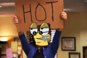 a woman holds up a sign that says hot