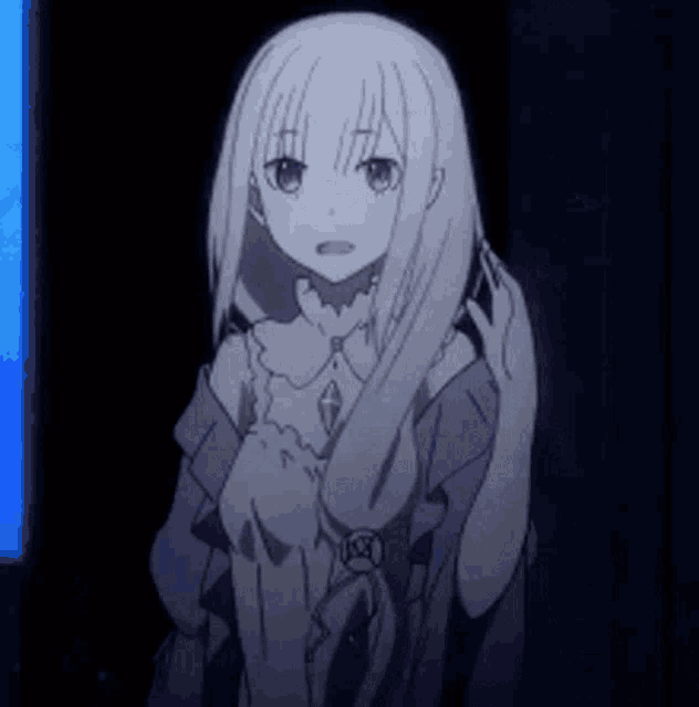 a girl with long white hair is standing in a dark room and looking at the camera .
