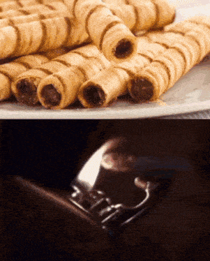 a close up of a plate of wafer rolls next to a picture of a lighter