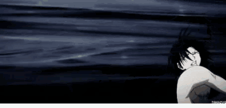 a black and white animated gif of a man swimming in the water .