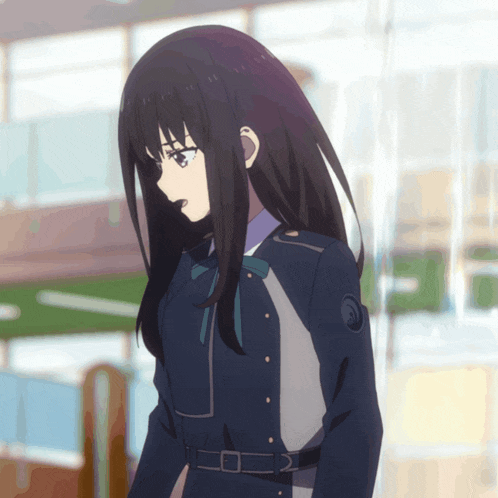 a girl with long black hair wearing a blue uniform