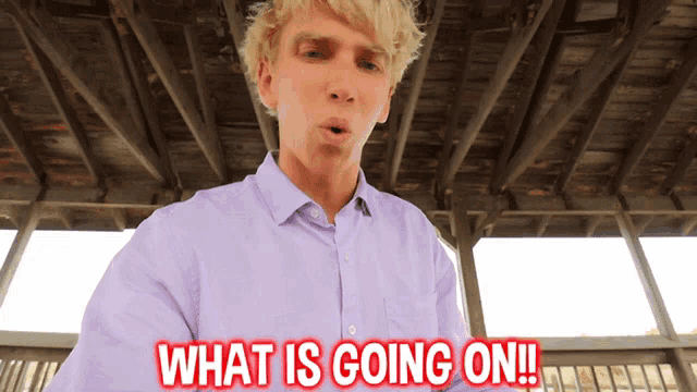a man says what is going on in red letters