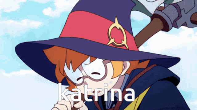 katrina is a witch with a broom in her hand