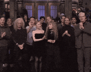 executive producer lorne michaels is standing in front of a group of people