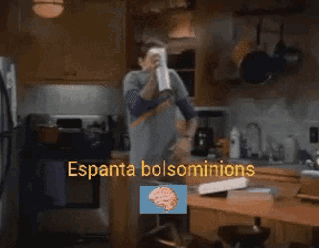 a man standing in a kitchen with the words espanta bolsominions on the bottom
