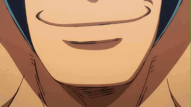 a close up of a person 's face with a smile