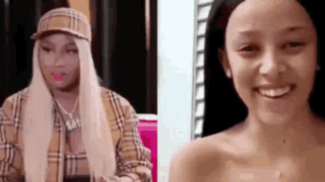 a woman in a plaid shirt and a woman without a shirt are smiling .