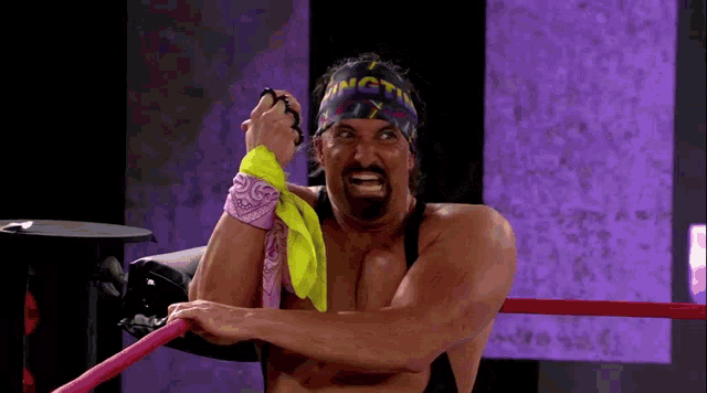a wrestler with a bandana on his head that says ' ingti ' on it