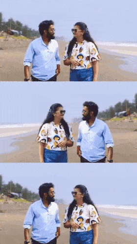 a man and a woman are standing on a beach and talking to each other