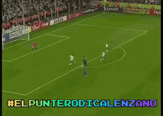 a soccer game is being played on a field with advertisements for gillette and bud