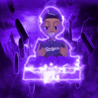 a dodgers player is holding a controller in his hands