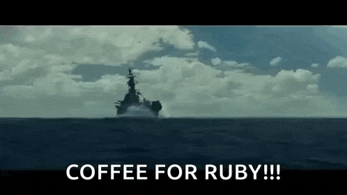 a large ship is floating in the middle of the ocean .