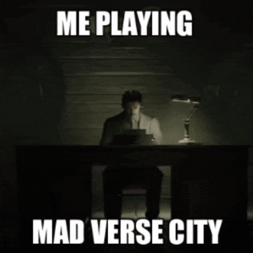 a meme of a man sitting at a desk with the words me playing mad verse city on the bottom