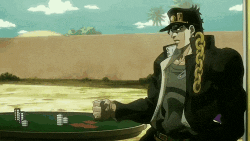 a man in a hat is standing in front of a table with poker chips on it
