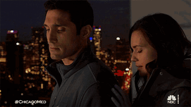 a man and woman standing next to each other with #chicagomed written on the bottom of the image