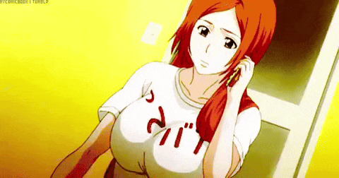 a woman with red hair is talking on a cell phone while wearing a white shirt that says ' bleach ' on it