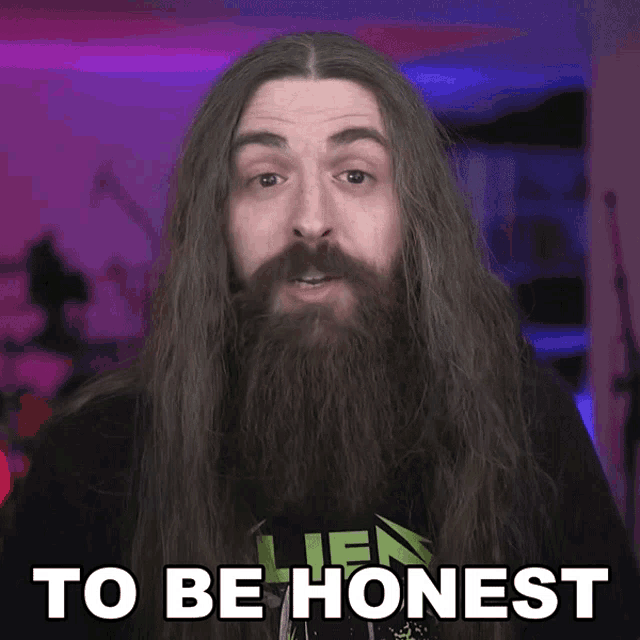 a man with long hair and a beard has the words to be honest above him