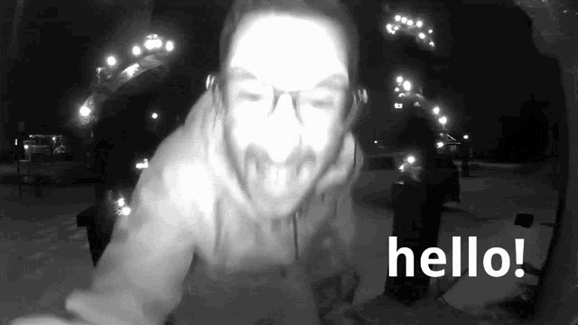 a black and white photo of a man with the words hello written below him