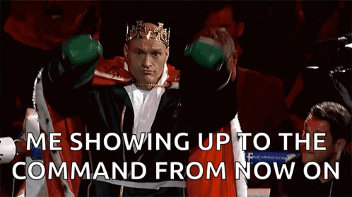 a man wearing a crown and boxing gloves with the words " me showing up to the command from now on " behind him