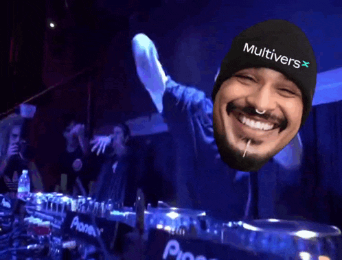 a man wearing a beanie that says multivers x