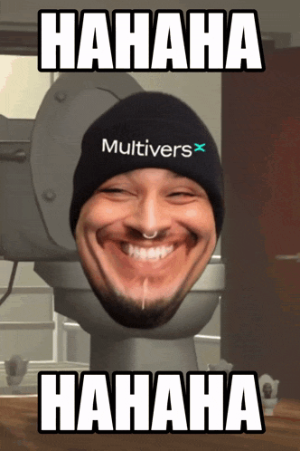 a man wearing a hat that says multivers on it is sitting on a toilet