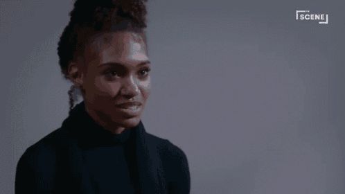 a woman in a black turtleneck with the words what did you do on the bottom
