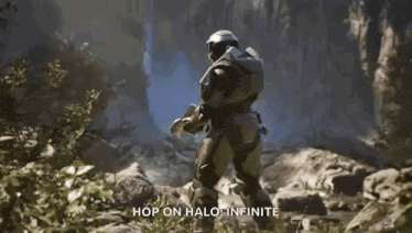 a video game character is holding a gun and says `` hop on halo : infinite ''