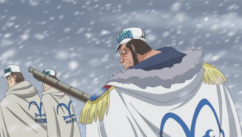 a man wearing a hat that says marine is standing in the snow