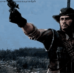 a man in a cowboy hat is pointing a gun at something in the distance