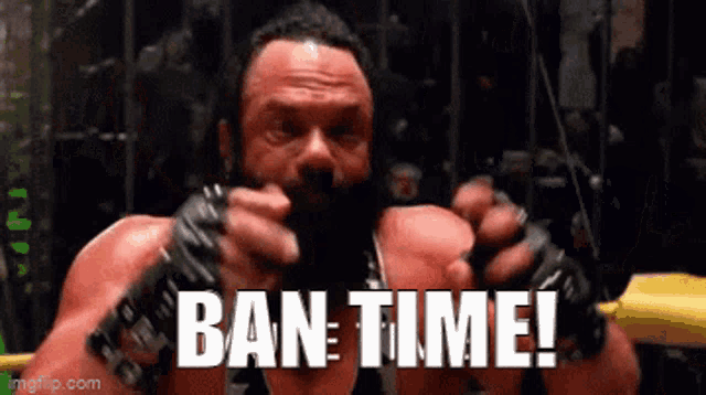 a man with a beard is in a boxing ring and says ban-time