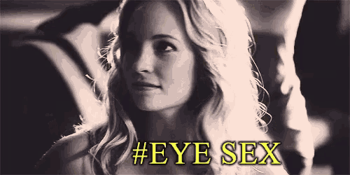 a black and white photo of a woman with #eye sex written on the bottom