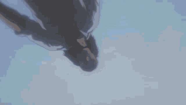 a man is flying through the air with his hands outstretched