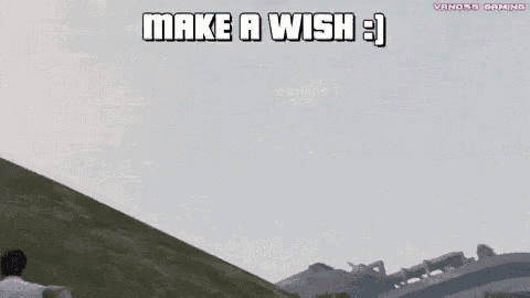 a plane is flying over a hill in the sky .