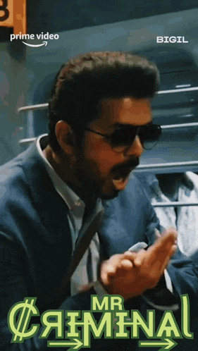 a movie poster for mr criminal shows a man wearing sunglasses