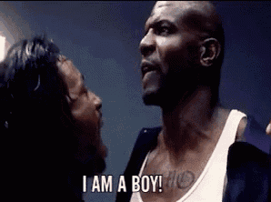 a man with a tattoo on his chest says i am a boy .