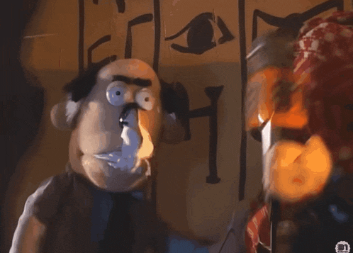 a cartoon character is holding a box with a label that says ' jack daniels ' on it