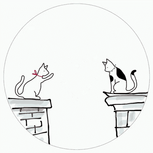 a couple of cats sitting on a ledge with red hearts surrounding them